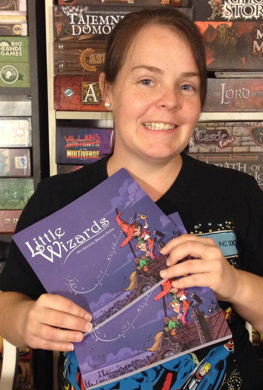 Molly with two copies of Little Wizards