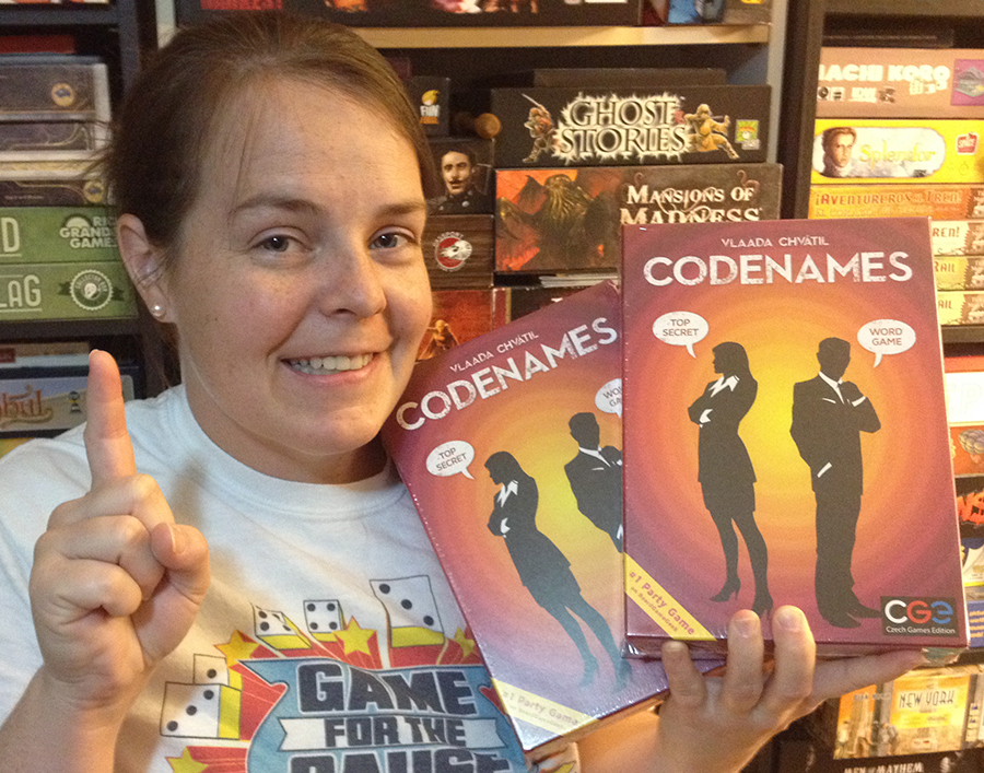 Molly with two copies of Codenames
