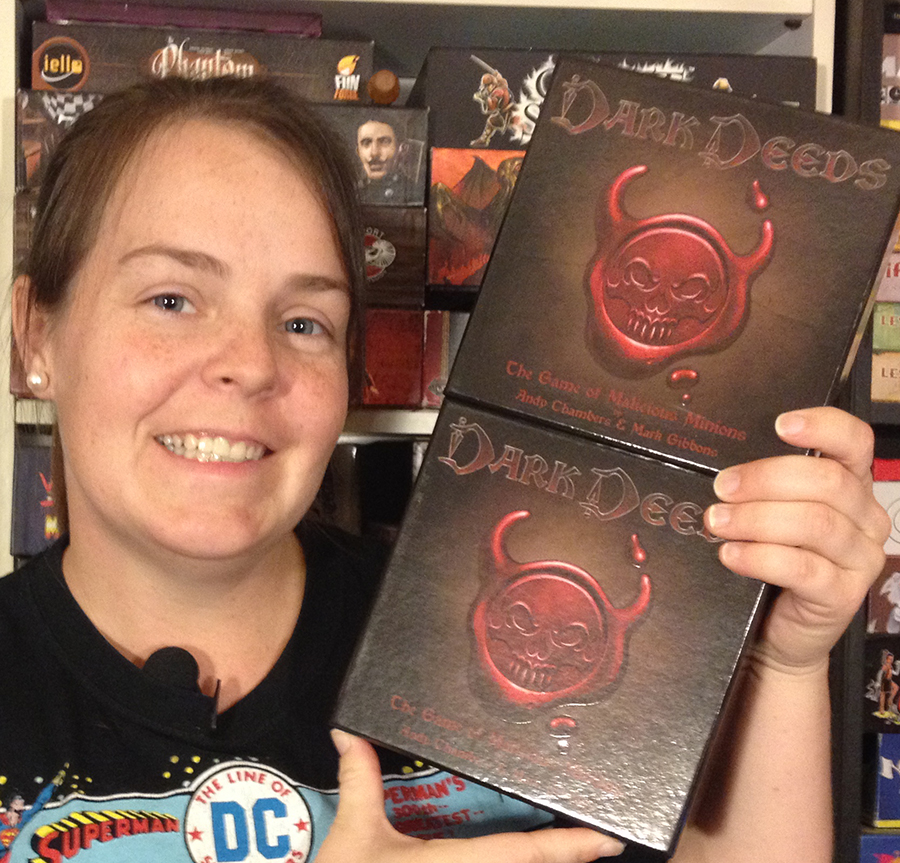 Molly with two copies of Dark Deeds